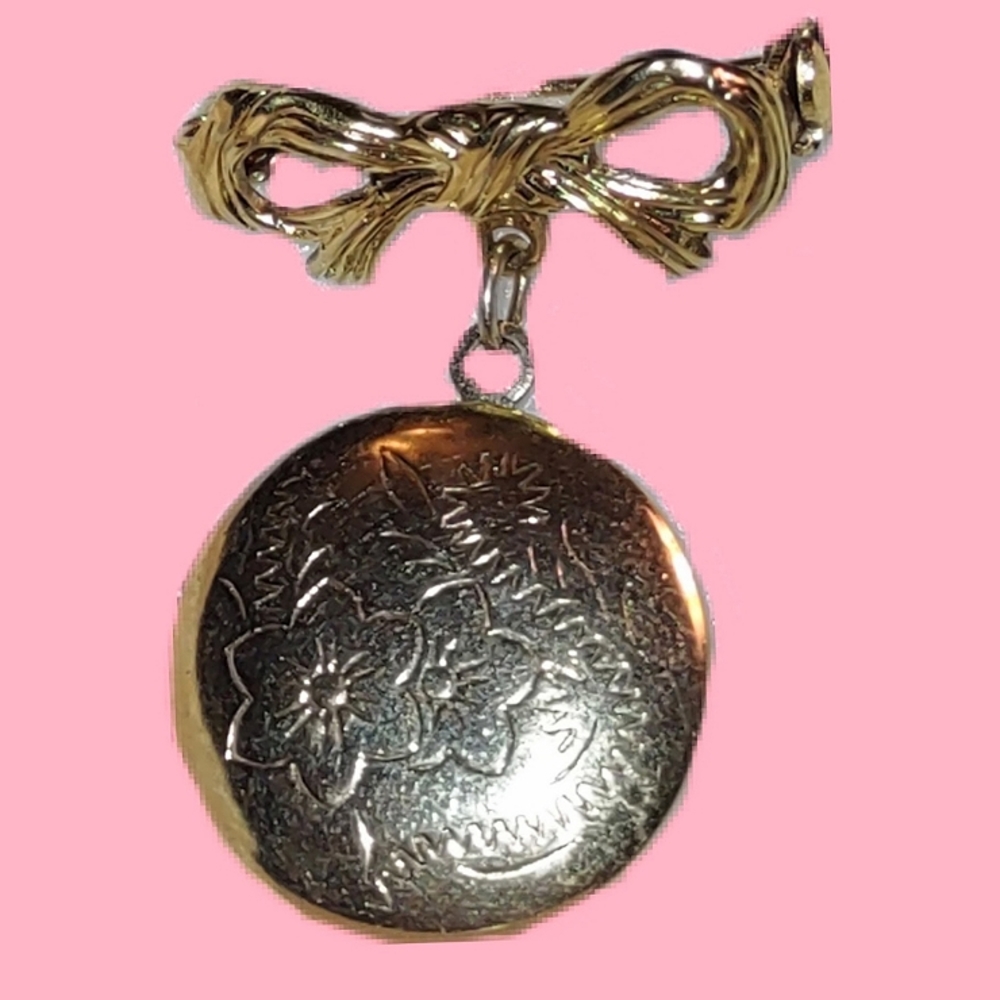 Bow Brooch with Dangling Round Gold Floral Locket